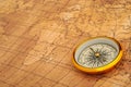 Compass on old map. Royalty Free Stock Photo