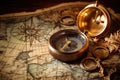 Compass and old map on wooden background. Vintage style toned picture, Vintage map, compass and old book on old map background, AI