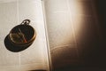 Compass on open bible Royalty Free Stock Photo