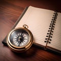 Compass on an open notebook symbolizes direction and exploration