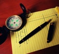 Compass pen and notebook Royalty Free Stock Photo