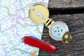 Compass and pocket knife Royalty Free Stock Photo