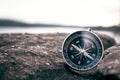 Compass on rock in the nature