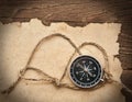 Compass, rope and old paper