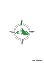 Compass rose logo featuring green, stylized mountain peaks at the center. The Royalty Free Stock Photo