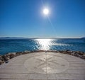 Compass by the sea Royalty Free Stock Photo