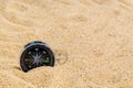 Compass in the sea sand on beach background with copy space for add text message or use components for design. Summer Travel