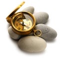 Compass and sea stones Royalty Free Stock Photo