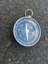 the compass shows the direction it& x27;s time to hit the road Royalty Free Stock Photo