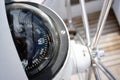 Compass up close on a sailing yacht to maintain course.
