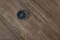 Compass in wood backgroundCompass in wood background.Flat lay.Travel concept