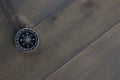 Compass on wooden background - free text space Royalty Free Stock Photo