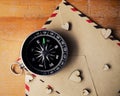 Compass on wooden background with space for text Royalty Free Stock Photo