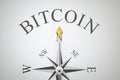 Compass with the word bitcoin