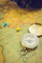 Compass on the world retro map. Selective focused. Vintage tone