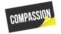 COMPASSION text on black yellow sticker stamp