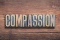Compassion word wood Royalty Free Stock Photo
