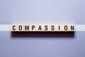 Compassion word concept on cubes Royalty Free Stock Photo
