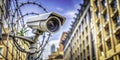 Candid CCTV Surveillance A Detailed Look at Urban Security Measures with Barbed Wire and Surveillance Cameras