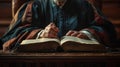 A compelling portrait of a distinguished judge their hands resting on a large book as they impart their words of wisdom