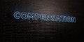 COMPENSATION -Realistic Neon Sign on Brick Wall background - 3D rendered royalty free stock image Royalty Free Stock Photo