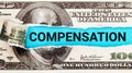 Compensation word written on with American Dollar-bills. Salary and wages concept. The word Compensation on dollar usa