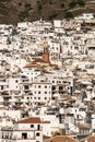 Vertical view of a whitewashed village in the hills above Malaga in the Andalusian backcountry Royalty Free Stock Photo