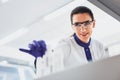 Competent medical worker examining samples Royalty Free Stock Photo
