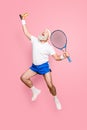 Competetive best cool healthy modern successful active grandpa with big tennis equipment raised in hand up. Healthcare