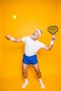 Competetive emotional cool grandpa with humor grimace exercising