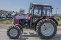 Competition for agricultural tractors on the green meadow. Bizo