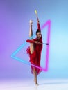 Creative artwork of prfessional female rhythmic gymnast in motion with club s over neon geometric element over