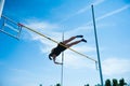 Competition pole vault jumper female Royalty Free Stock Photo