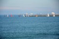 Competition of small sailing boats near the commercial port of Porto