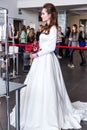 Competition of wedding stylists. Model In a wedding dress, with hair and make-up, we are waiting for the jury's