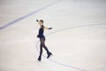 Competitions in figure skating among children.Young athlete skater skates the program