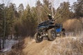 Competitions in a jeep trial in a group of ATVs.