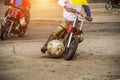 Competitions on motoball, players are furiously fighting for the ball, playing football on motorcycles, motor bicycle
