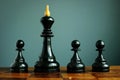 Competitive edge or business advantage in recruitment. Pawns and chess king Royalty Free Stock Photo