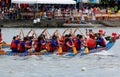 A competitive racing on Keelung River, where the women athletes pull vigorously on the oars to the pace of the drumbeats by the te