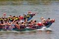 A competitive racing on Keelung River, where the women and men athletes pull vigorously on the oars to the pace of the drumbeats