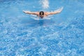 Competitive Swimmer training butterfly style Royalty Free Stock Photo