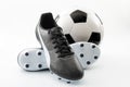 Competitive team sports, active life hobbies and athletic gear concept with old-fashioned black leather football cleats or