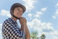 Competitive Woman Putting On A Helmet Getting Ready For Horse Riding Competition Royalty Free Stock Photo