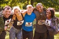 Competitors celebrate completing an extreme endurance event Royalty Free Stock Photo