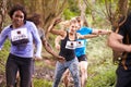 Competitors enjoying a run in a forest at an endurance event Royalty Free Stock Photo