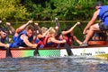 Competitors Racing in Dragon Boat on the River Ouse at St Neots. Royalty Free Stock Photo