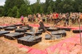 Competitors Run Across Floating Platforms At Extreme Obstacle Course Race