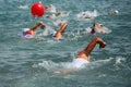 Competitors swimming out into open water