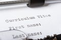 Writing a curriculum vitae with typewriter